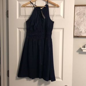 Navy halter dress with delicate detail